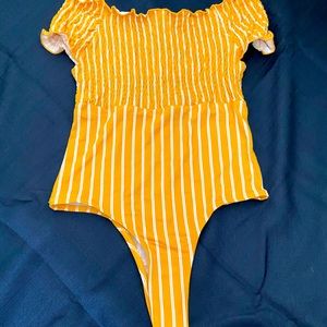 Off the shoulder body suit